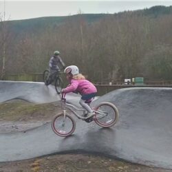 Photograph showing rider on a pump track